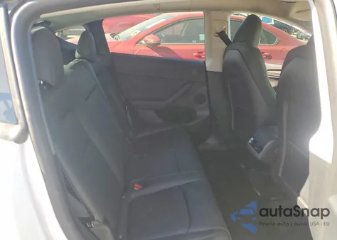 2024 Tesla Model Y из США, поврежденный, VIN 7SAYGDED5RF039377